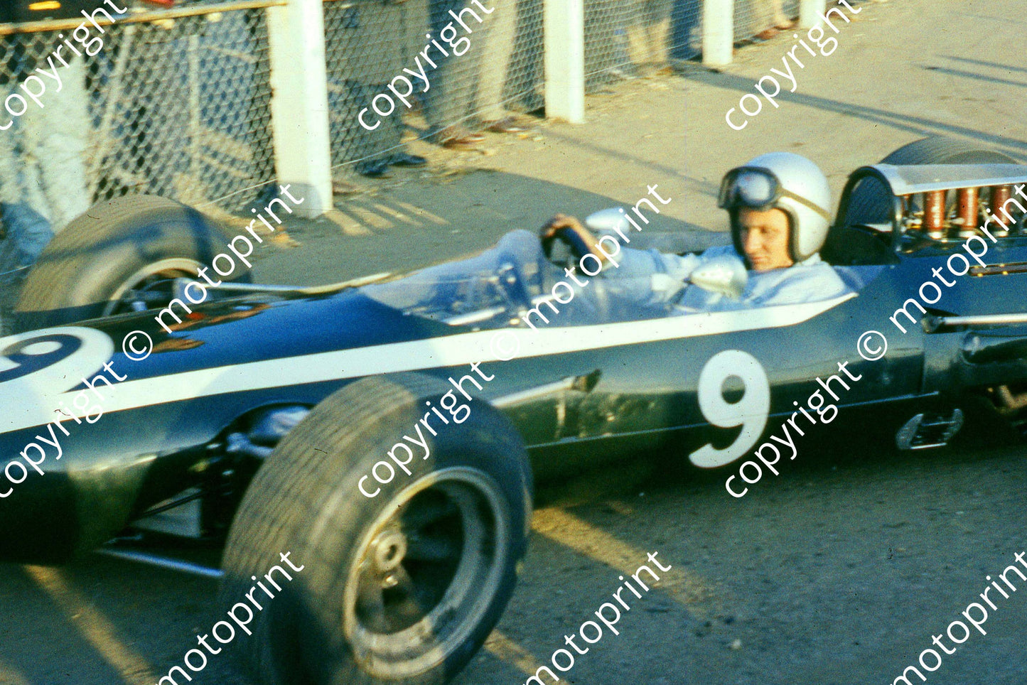1965 a4 9 Bruce McLaren Cooper Climax T73 F1-2-65 not sharp (courtesy Roger Swan) 031