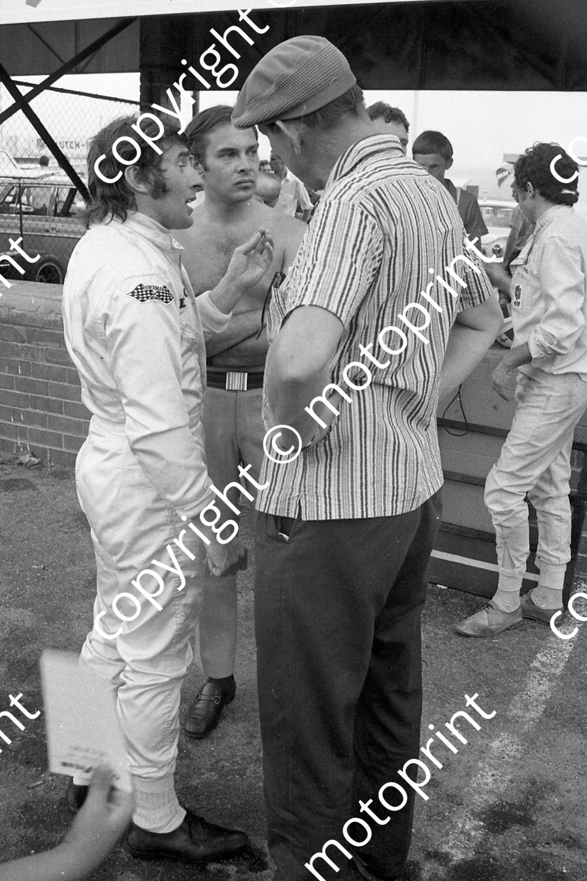 1969 SA GP Jackie Stewart, Ken Tyrrell, behind Jean-Pierre Beltoise note left arm (courtesy Ken Stewart) 103