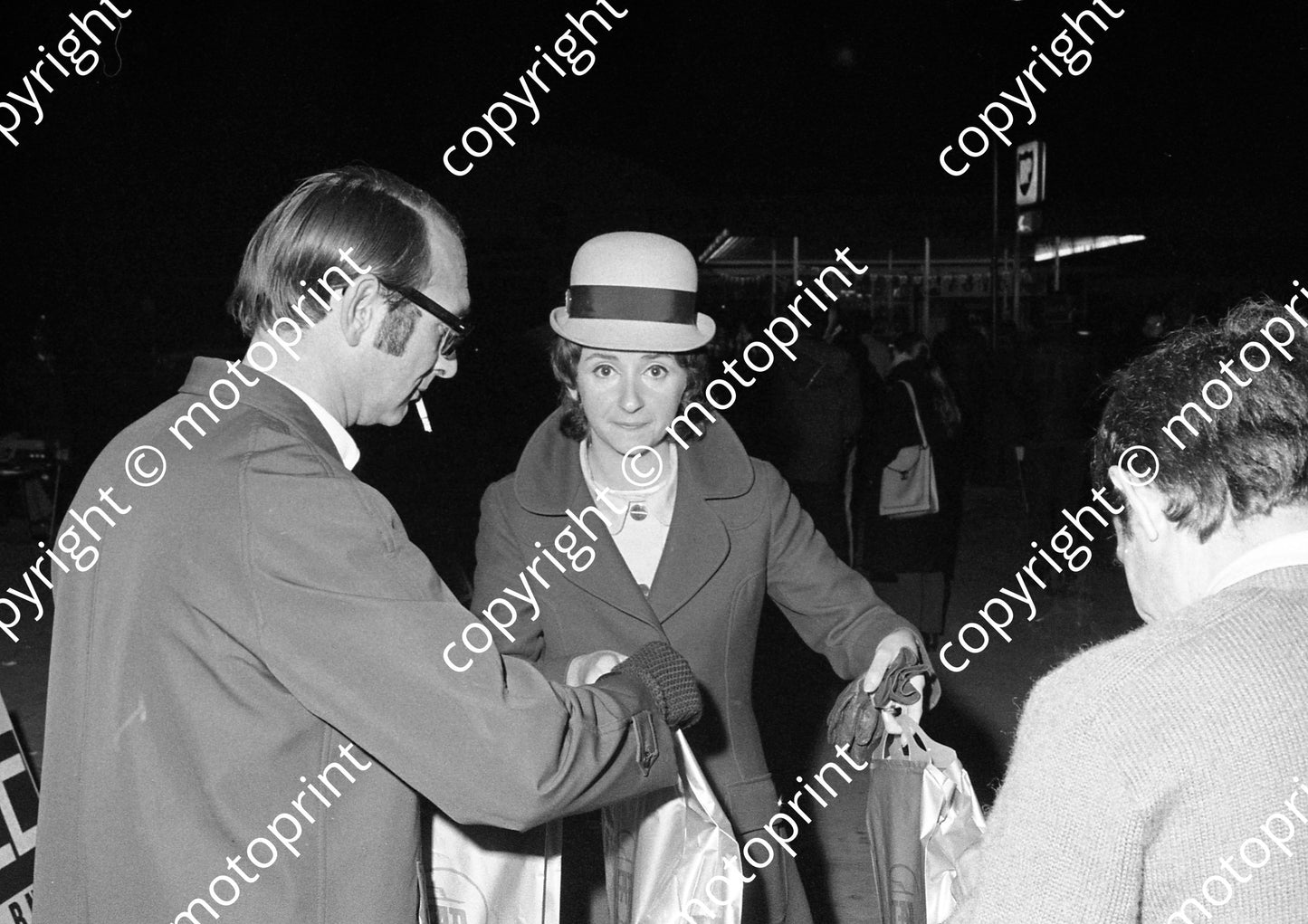 1971 BNU TAP rep handing out food parcels - airline food perhaps K500G (courtesy Roger Swan) (26)