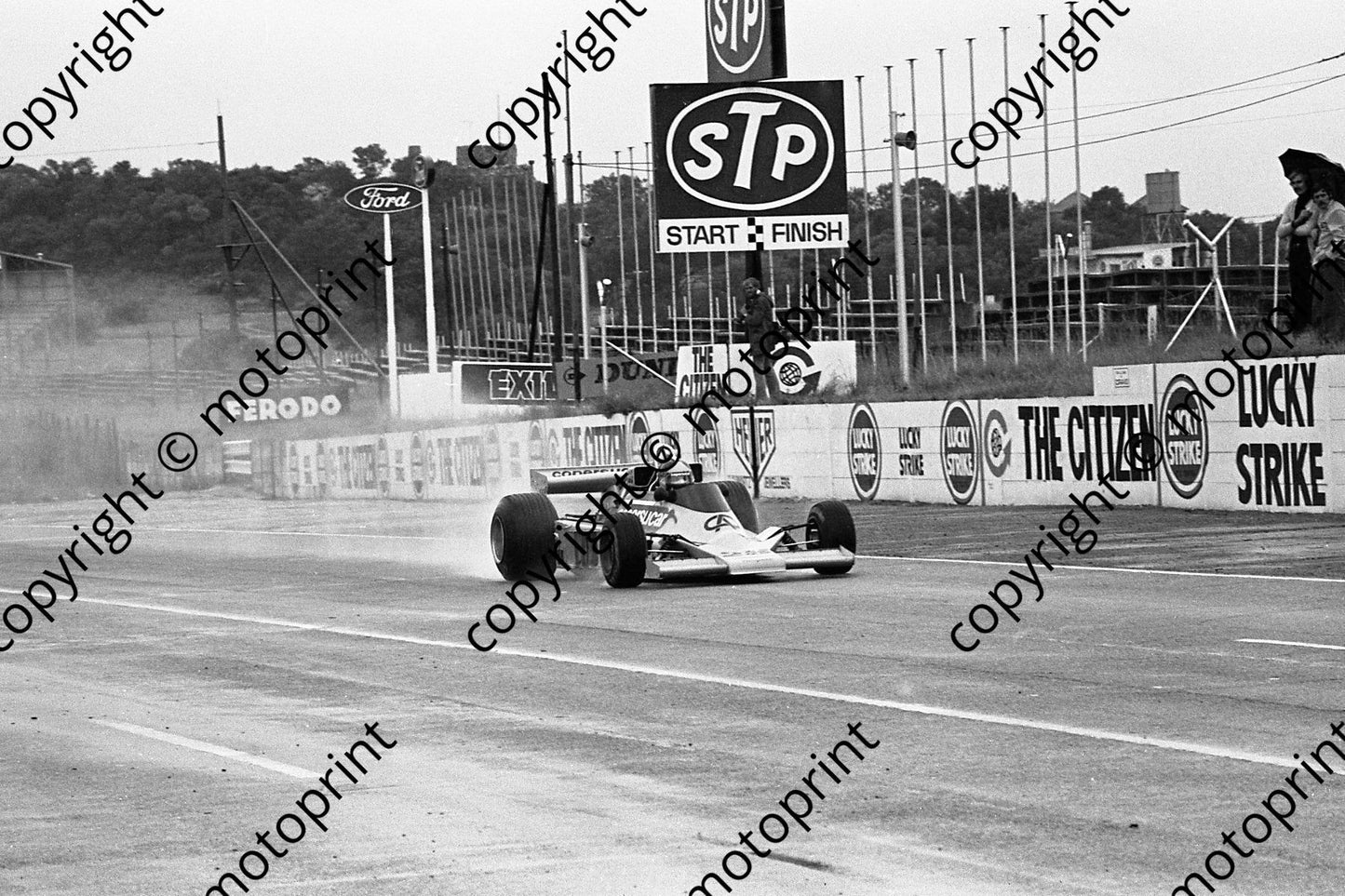 1977 SA GP 28 Emerson Fittipaldi FD04 Fittipaldi rain prac (permission Malcolm Sampson Motorsport Photography)