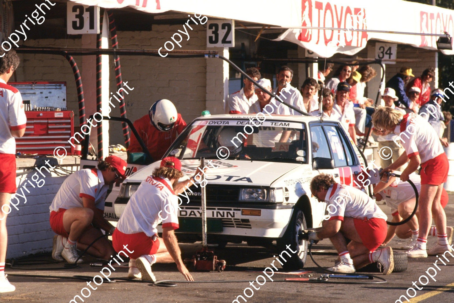 1987 6 hr 22 pits Leon Mare, Steve Wyndham Toyota pits (Roger Swan) (204)