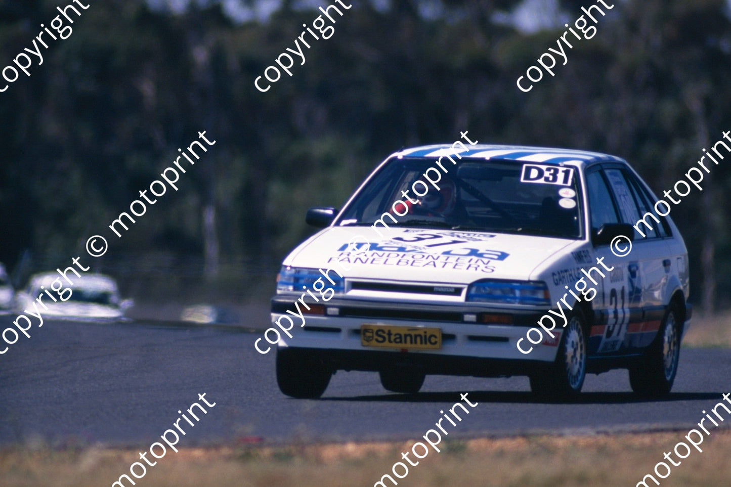 1988 6 hr 31 Fanie Els, Garth le Roux Mazda 323 EGi (Roger Swan) (1)