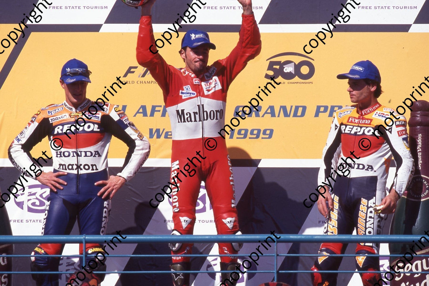1999 Phakisa SA GP 500 podium Sete Gibernau 2nd, Max Biaggi 1st, Alex Criville 3rd (Watling Photo) (4)