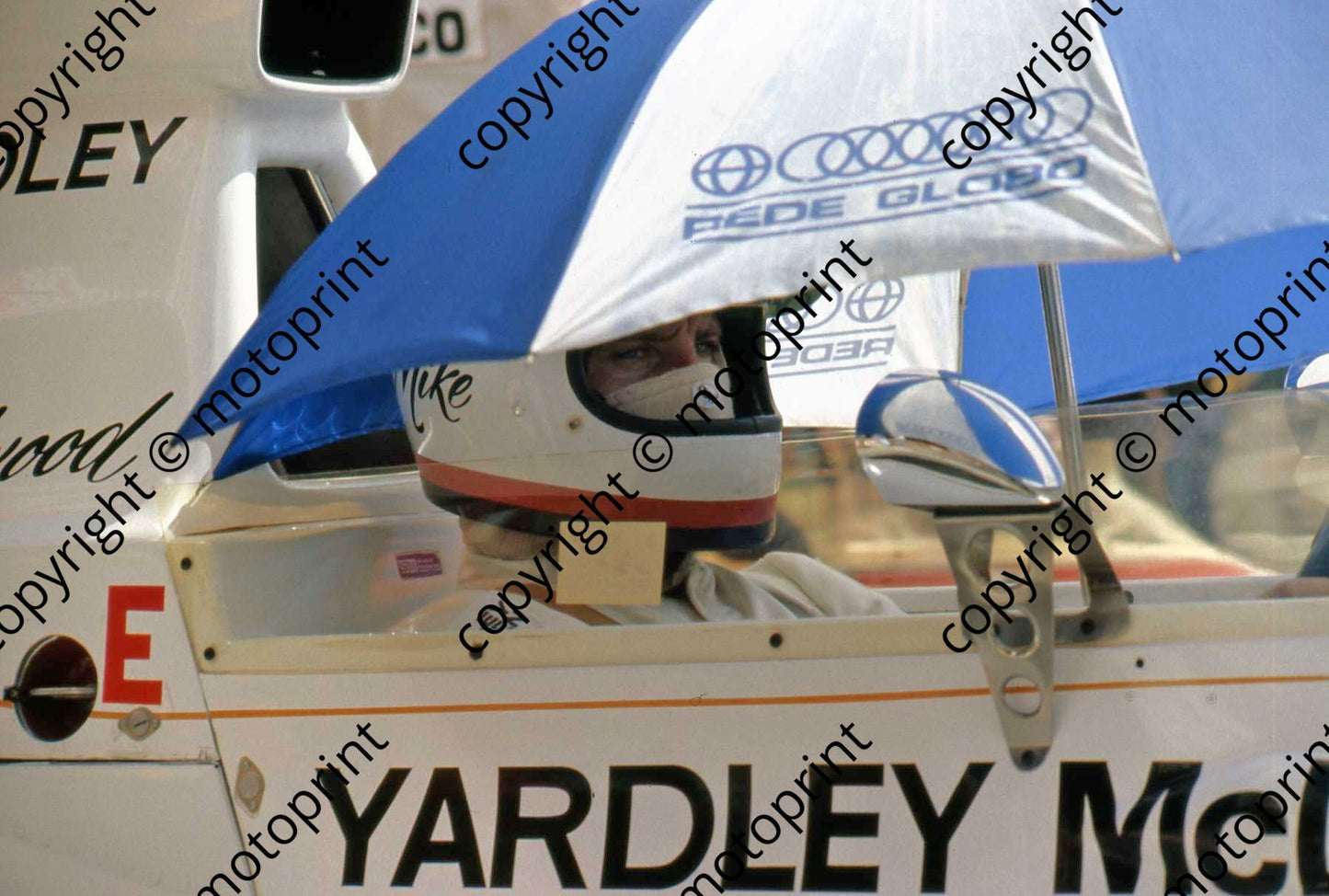 P Hailwood under umbrella Yardley McLaren M23