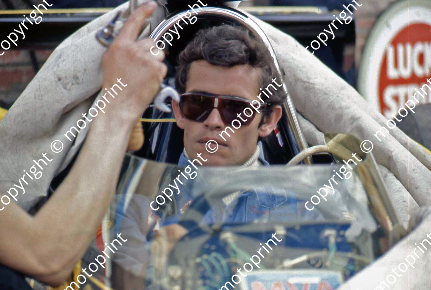 P Ickx in Lotus 76 pits