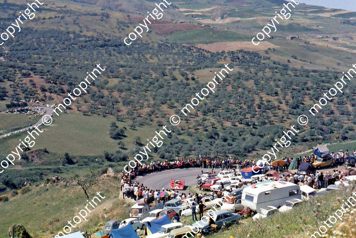 SP Hairpin and Ferrari 312 makes its way up