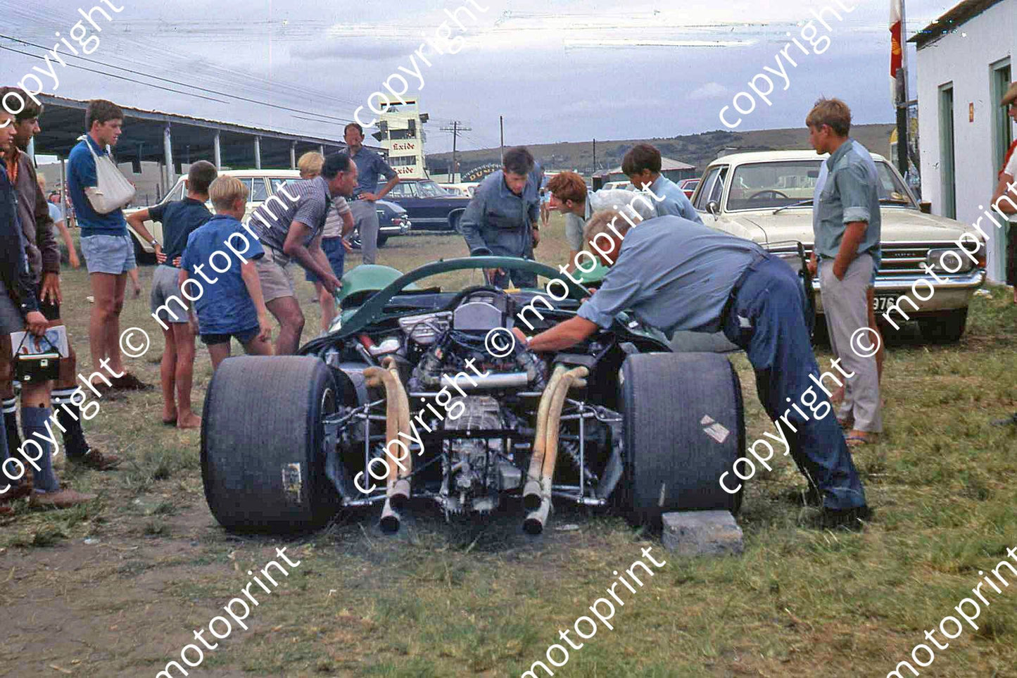 SP Piper Ferrari P4 rear view stripped in paddock