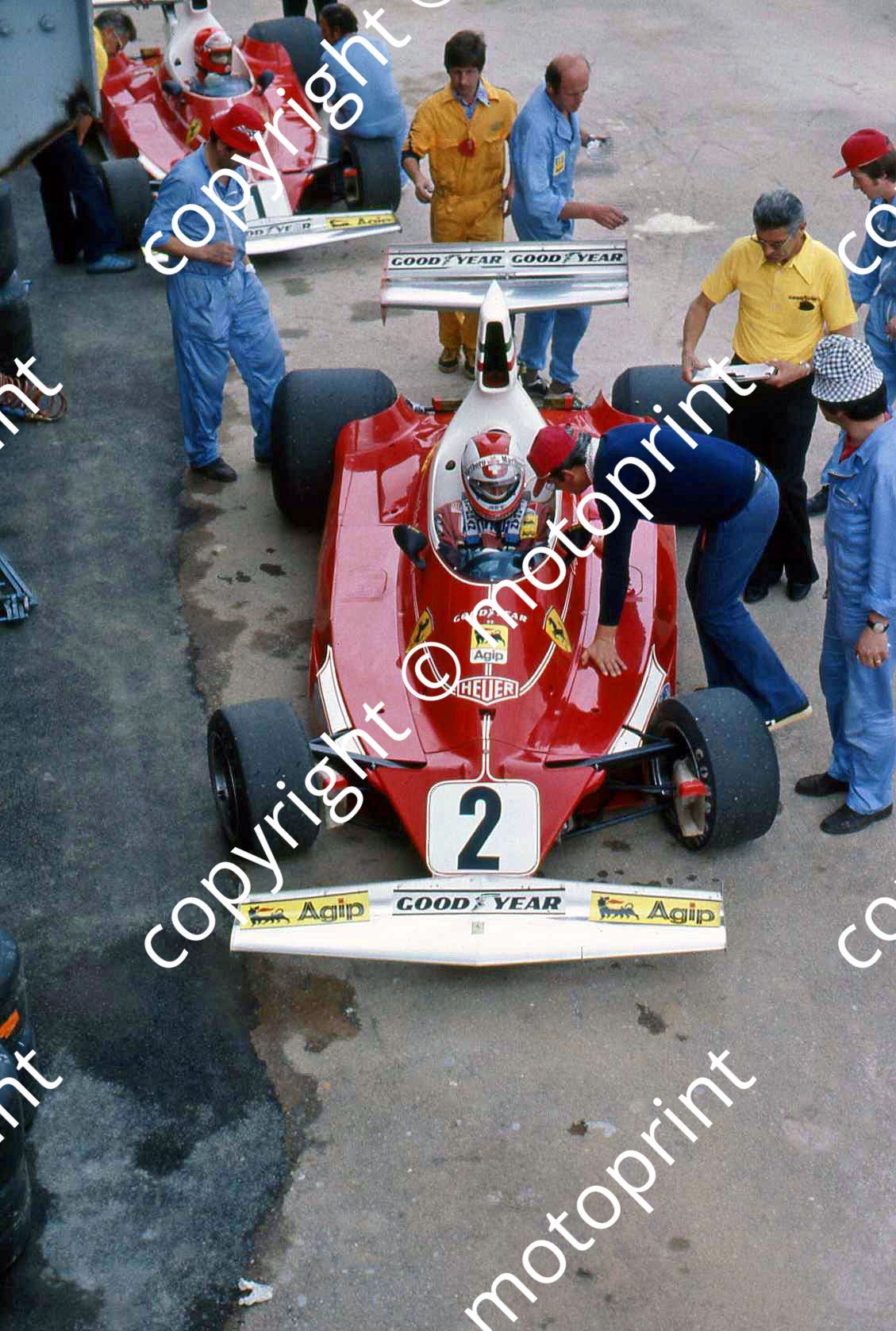 SS 2 Regazzoni and Lauda in pits with 312T2s