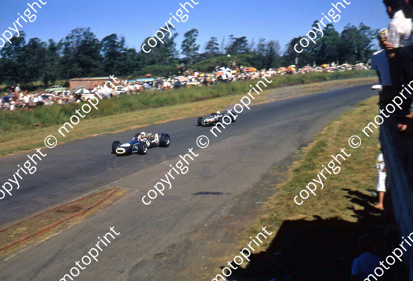 SS Charlton Brabham BT11 leads Love T79 Cooper