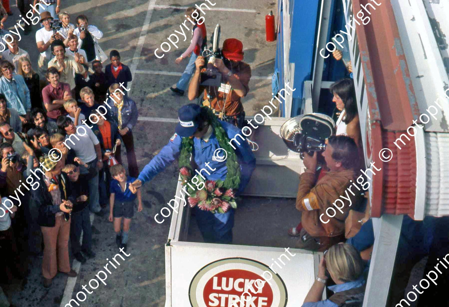 SS Reutemann on podium