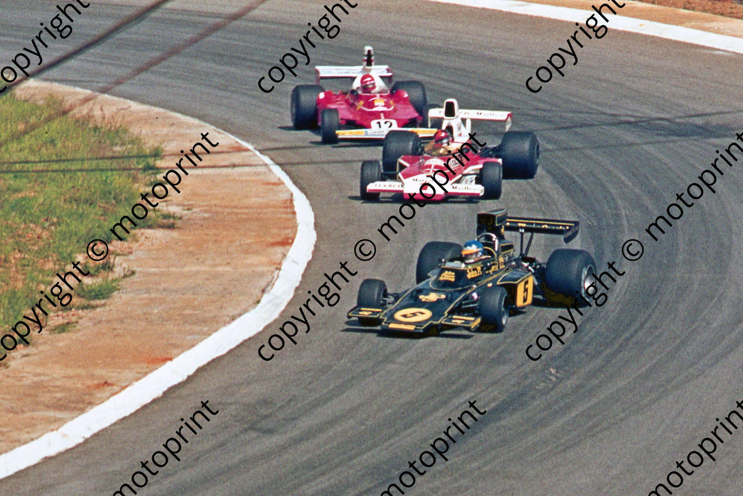 SS (thanks Stuart Falconer) a 452 1975 SA GP Peterson, Fittipaldi M23_ Lauda 312T cropped scanned 20x30 cm A4