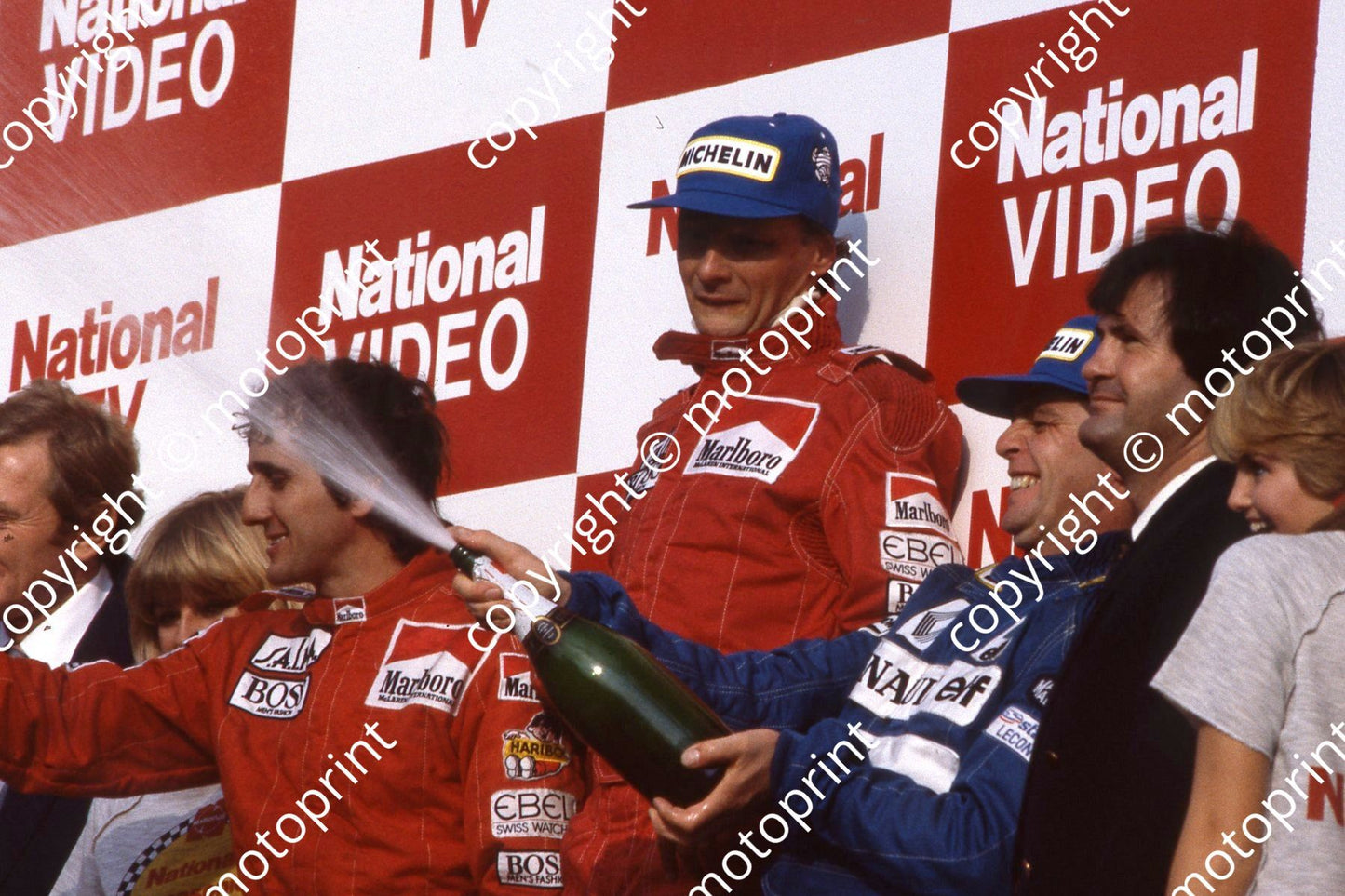 podium Derek Warwick spraying, Niki Lauda, Alain Prost (courtesy Roger Swan) 627
