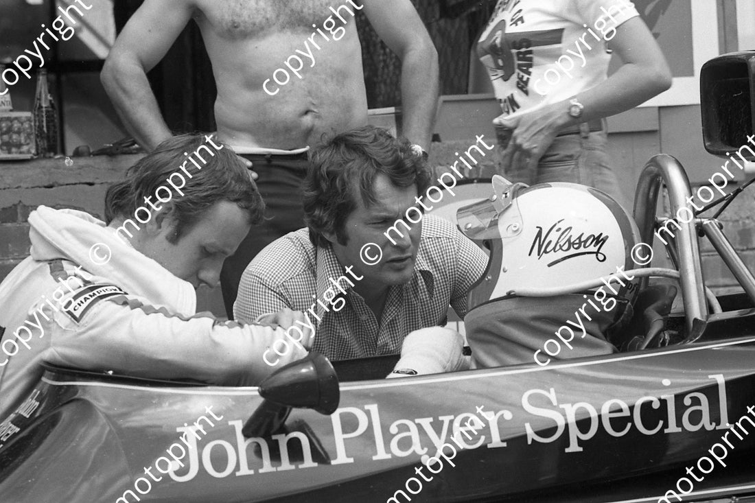 Bob Evans, Robin Herd, & Gunnar Nilsson in the Kyalami pits, 1976
