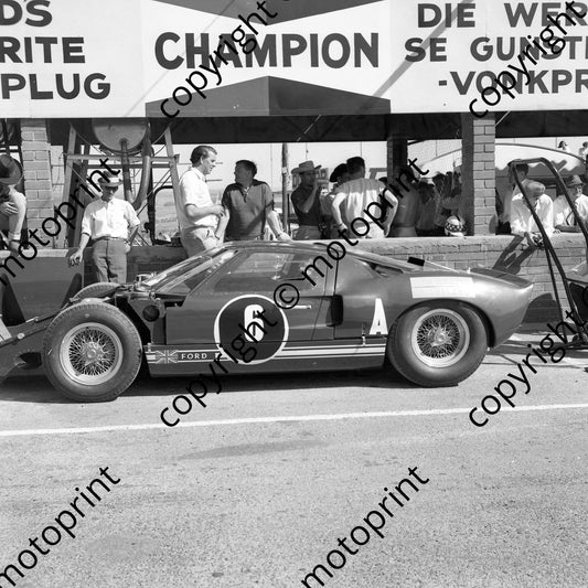 1965 6 Peter Sutcliffe, Innes Ireland Ford GT40 Roy Pierpoint left, Paddy Driver in Stetson, Innes Ireland to right behind pit counter  (courtesy Ken Stewart)(5)