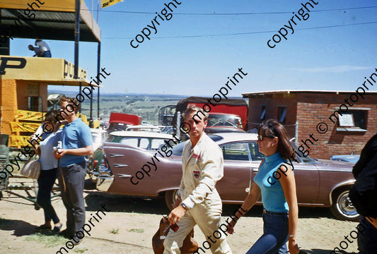 1967 SA GP Mike Spence and wife note car in background (thanks Vito Momo via G Cavalieri) 026