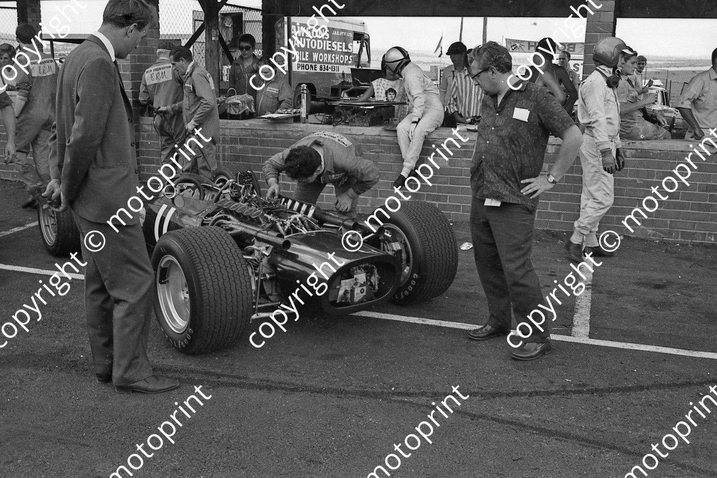1968 SA GP BRM P126 Pedro Rodriguez car, driver on pit counter, Mike  Spence (courtesy Ken Stewart)