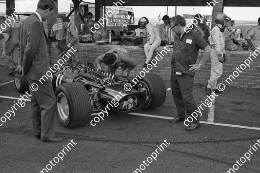 1968 SA GP BRM P126 Pedro Rodriguez car, driver on pit counter, Mike  Spence (courtesy Ken Stewart)