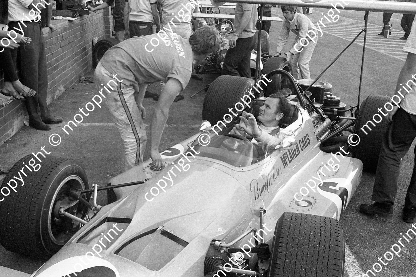 1969 SA GP Bruce McLaren in M7a Alistair Caldwell alongside (courtesy Ken Stewart) 129