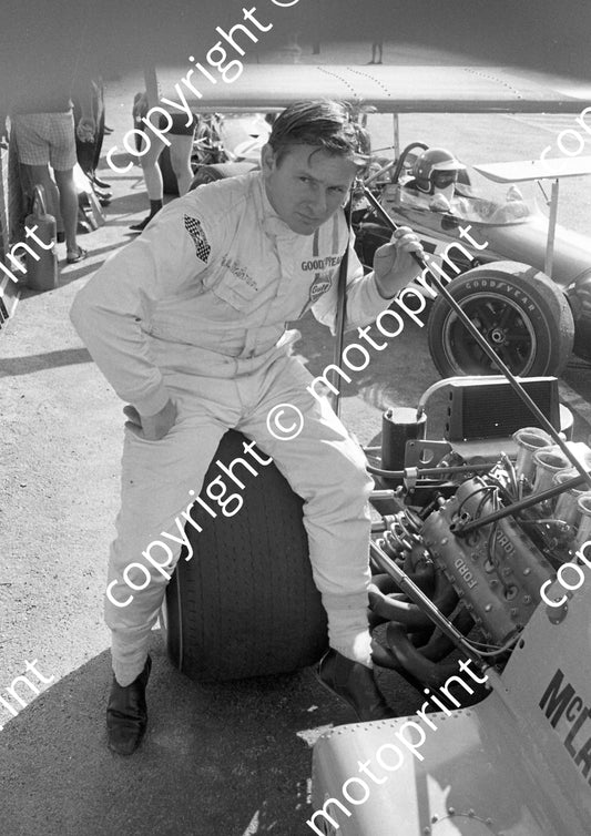 1969 SA GP Bruce McLaren sitting under wing M7 (courtesy Ken Stewart) 077