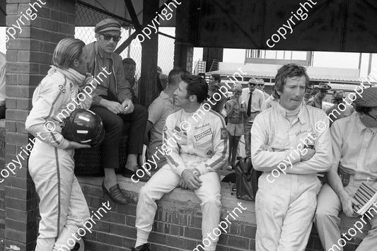 1969 SA GP Graham Hill, Colin  Chapman, Mario Andretti, Jochen Rindt (courtesy Ken Stewart) 111