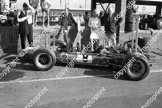 1969 SA GP Jean-Pierre Beltoise Matra Ford OCCUPYING BRM PIT, behind Pat Surtees, Louis and Jean Stanley (courtesy Ken Stewart) 022