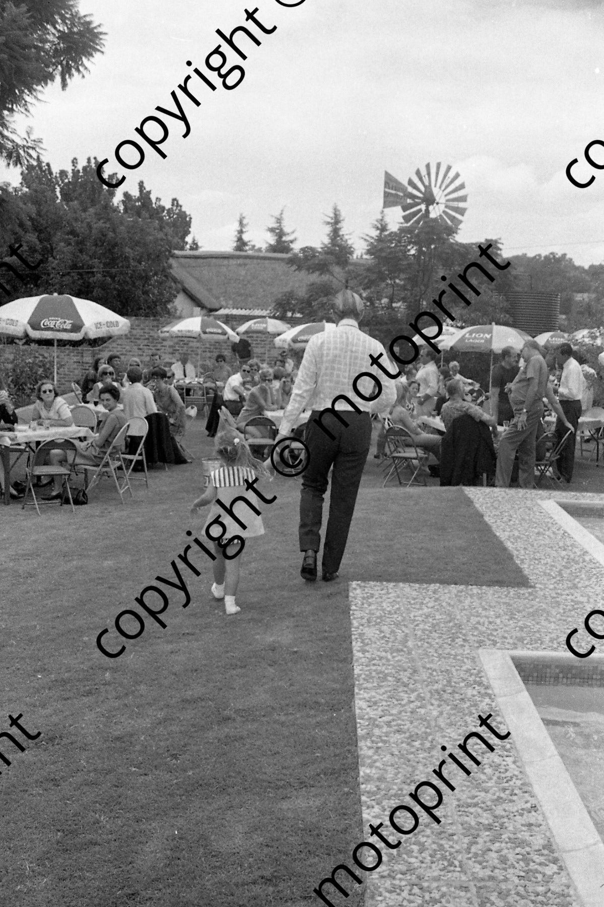 1969 SA GP prizegiving Graham HIll and daughter (courtesy Ken Stewart) 119