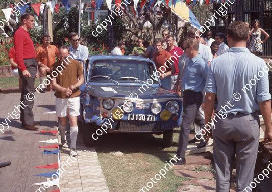1969 Total Rally d 23 Chris Swanepoel, Gus Crous R8 dinged Scamp at RH door, MIke Cole at LH door (Ben van Rensburg) (1)