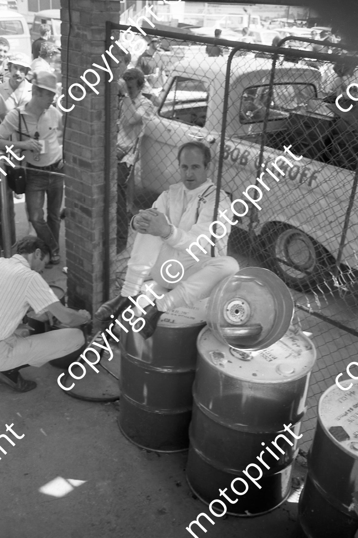 1970 SA GP Hulme perched on petrol drum (thanks Ken Stewart) 115