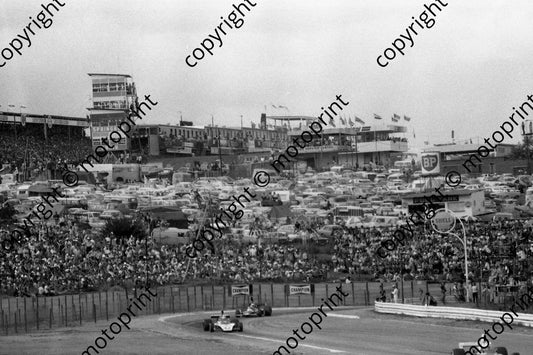 1975 SA GP 32 Ian Scheckter Tyrrell 007-1 note crowd 235