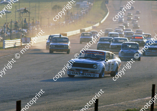1977 Wynns 31 George Santana Mike O_ Sullivan Datsun 140Y in front of pack at Crowthorne (courtesy Roger Swan)
