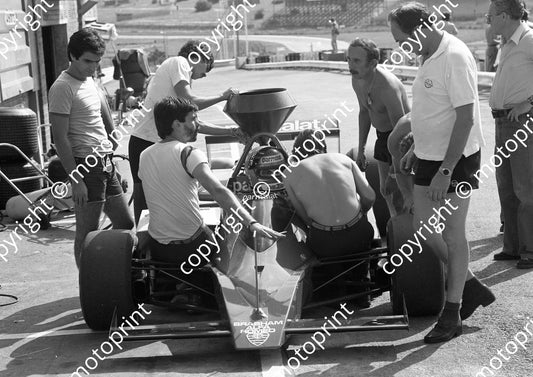 1978 SA GP Niki Lauda Brabham_ Nelson Piquet left, Gordon Murray on front suspension, Ermano Cuoghi at right rear(  scanned A4 20x30 cm) 391