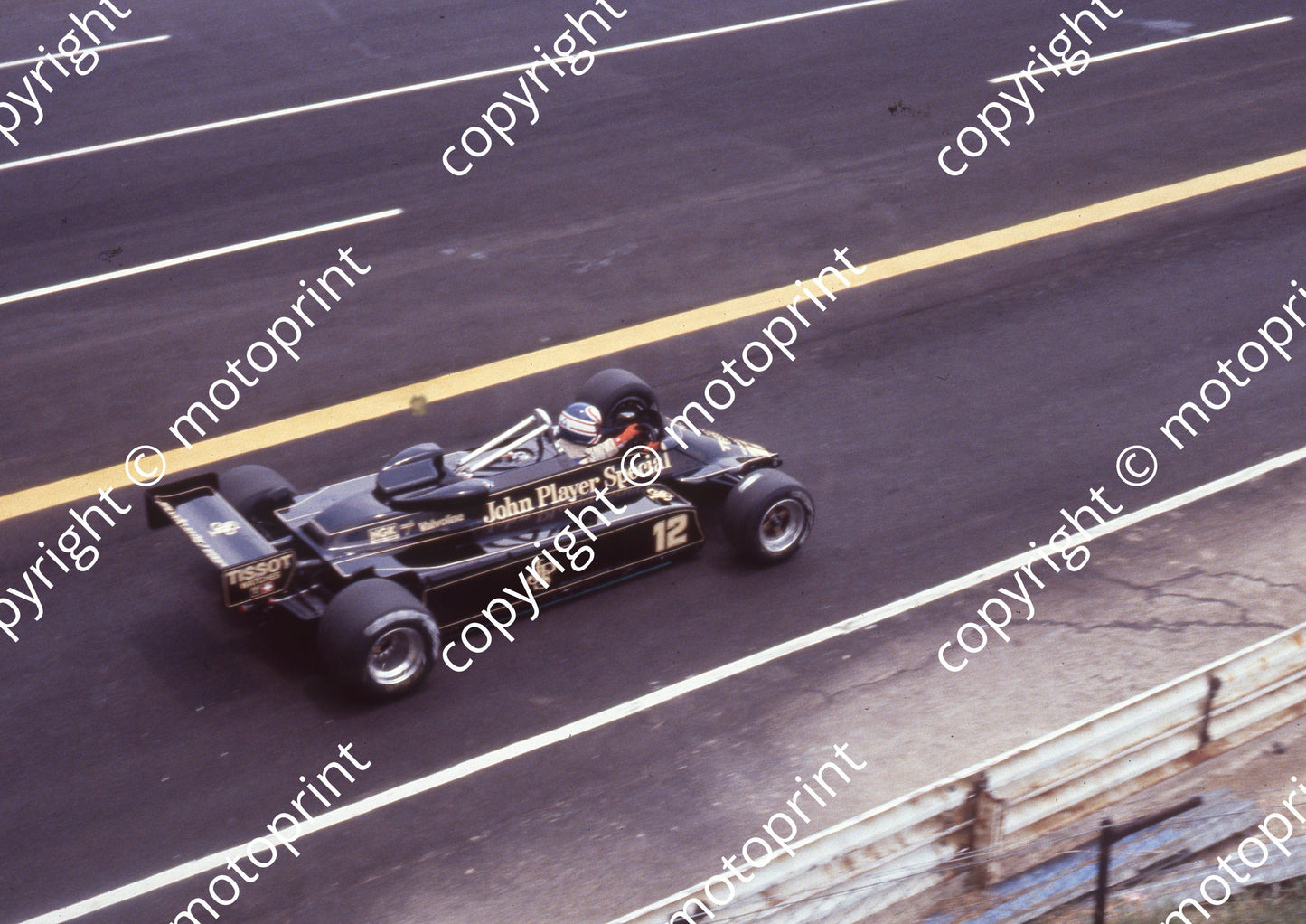 1982 SA GP 12 Nigel Mansell Lotus 87B-05 pre-race (Colin Watling Photographic) (10)