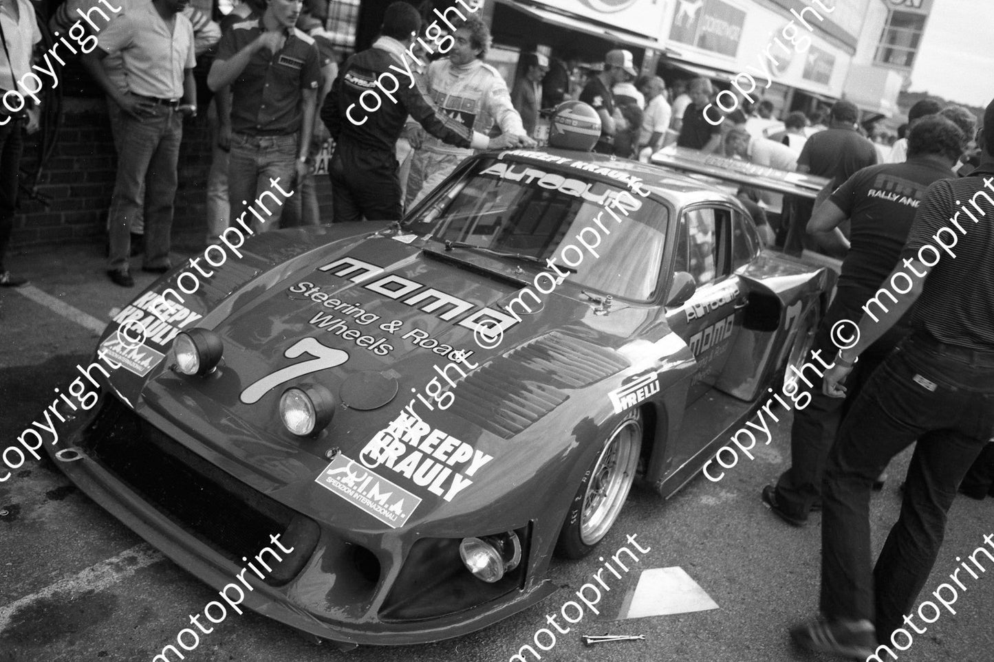 1982 9hr 7 Porsche 935 Gianpiero Moretti, Mauro Baldi behind car