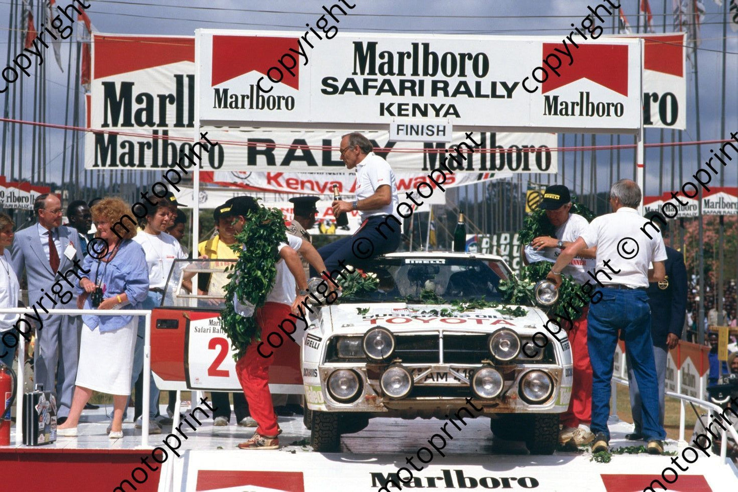 1986 Safari 2 winners Fred Gallagher, Bjorn Waldegard rostrum (courtesy Roger Swan) (481)