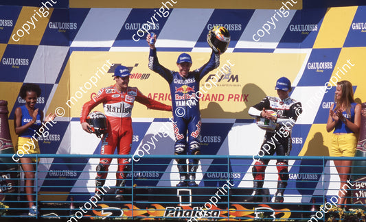 2000 Phakisa SA GP 500 podium Gary McCoy centre, Carlos Checa left, Loris Capirossi right (Colin Watling Photographic) (91)