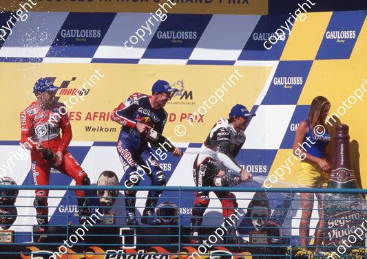 2000 Phakisa SA GP 500 podium Gary McCoy centre, Carlos Checa left, Loris Capirossi right (Colin Watling Photographic) (94)