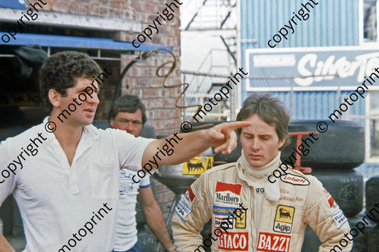 P Scheckter and Villeneuve in pits