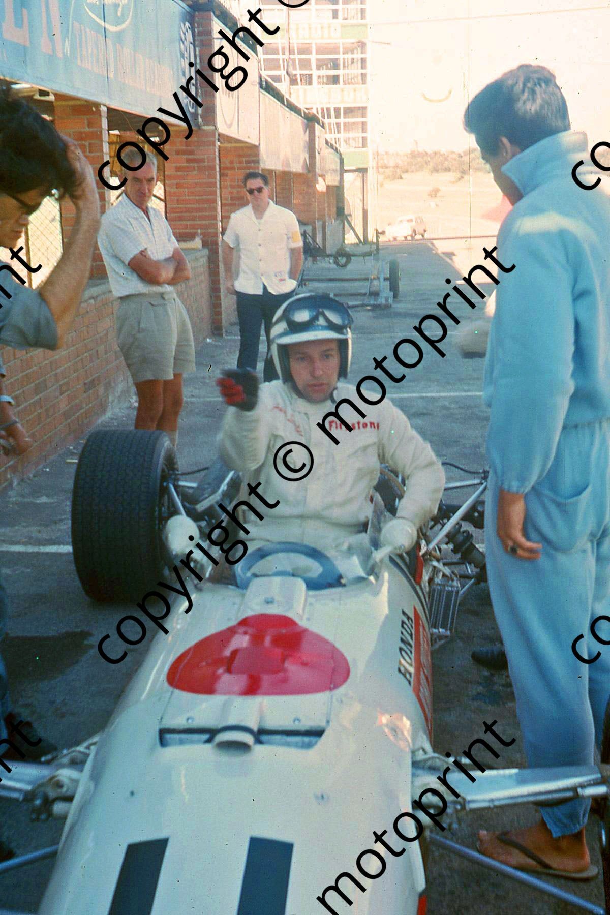 P Surtees in Honda RA273 cockpit practice