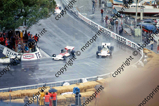 SS Beltoise moving through traffic W. Fittipaldi and Redman