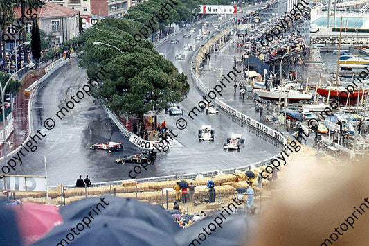 SS Coming up to start, front row Fittipaldi, Ickx