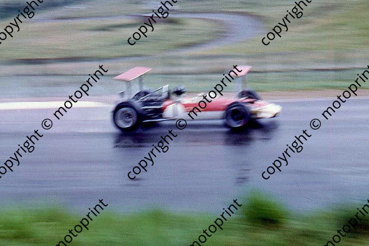 SS Graham Hill in rain Lotus 49 all wings GLTL poor focus