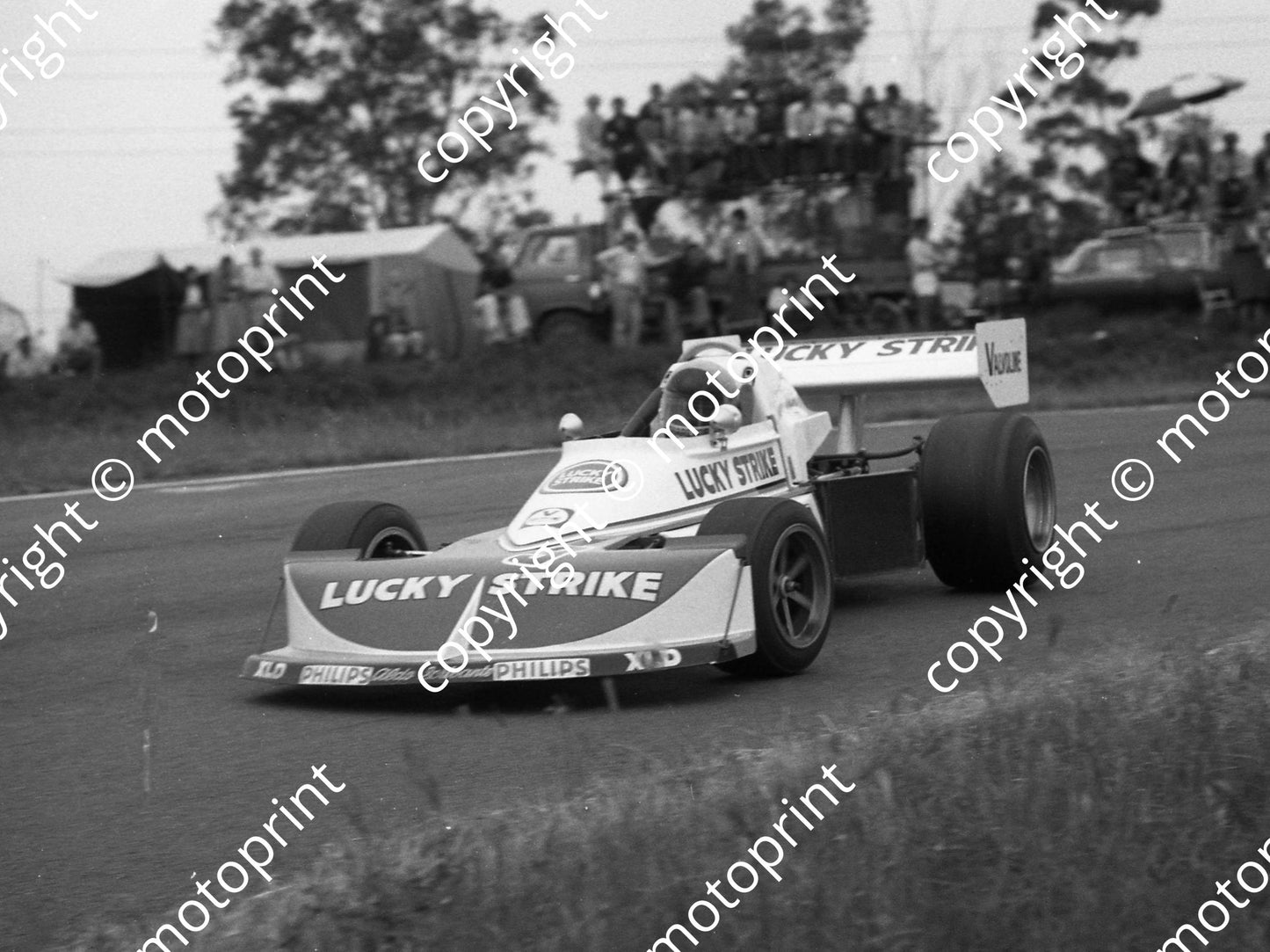 SS Hesketh  (permission Malcolm Sampson Motorsport Photography) 1977 Hesketh 15 Jan Charlton March sliding (8)