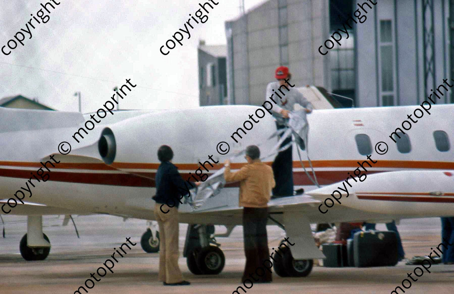 SS Lauda covering plane engine