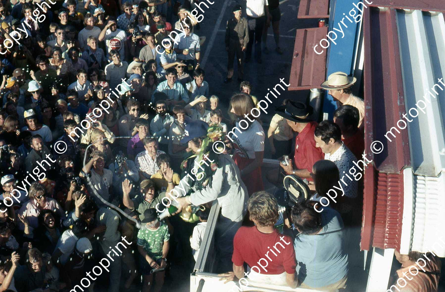 SS Stewart sprays champagne