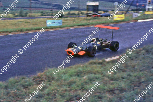 SS (thanks Stuart Falconer) a 180 1969 SA GP Surtees BRM rear wing rain cropped