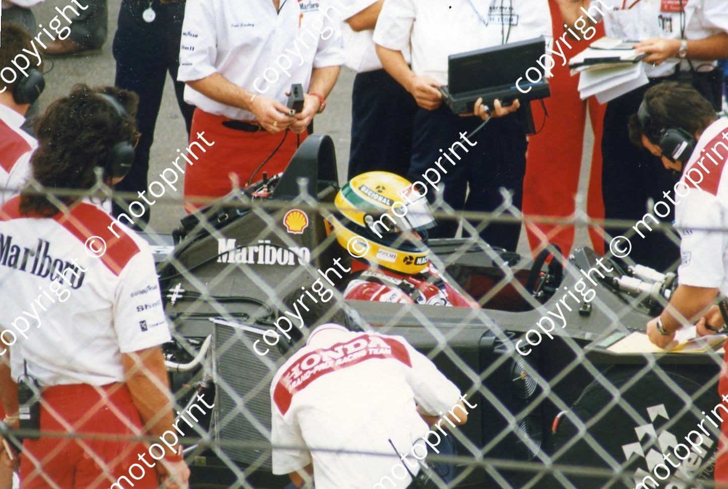 Senna in MP4 6b on grid