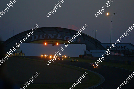 grid 5 0 12 Lola T70 Mk3 69 Ligier JS3 23 Porsche 917 Sat evening Dunlop Bridge (5)